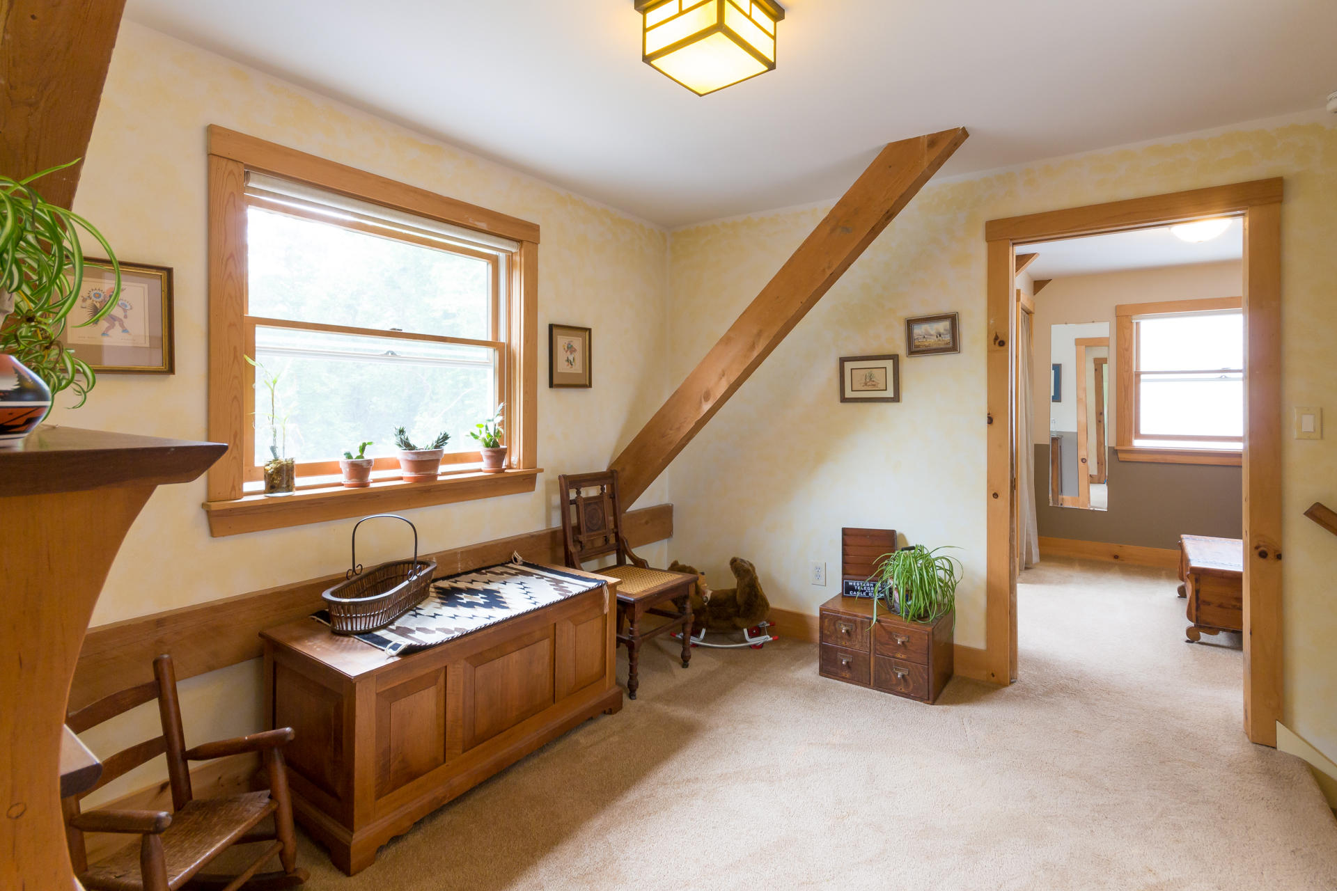 5 Marchants Path Edgartown, MA 02539 - Photo 28 of 45 a living room with furniture and a potted plant