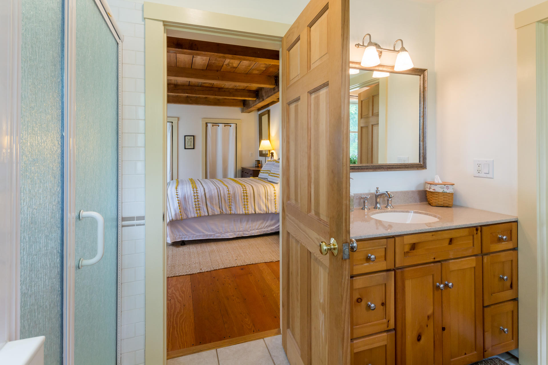 5 Marchants Path Edgartown, MA 02539 - Photo 8 of 45 a bathroom with a sink and a mirror