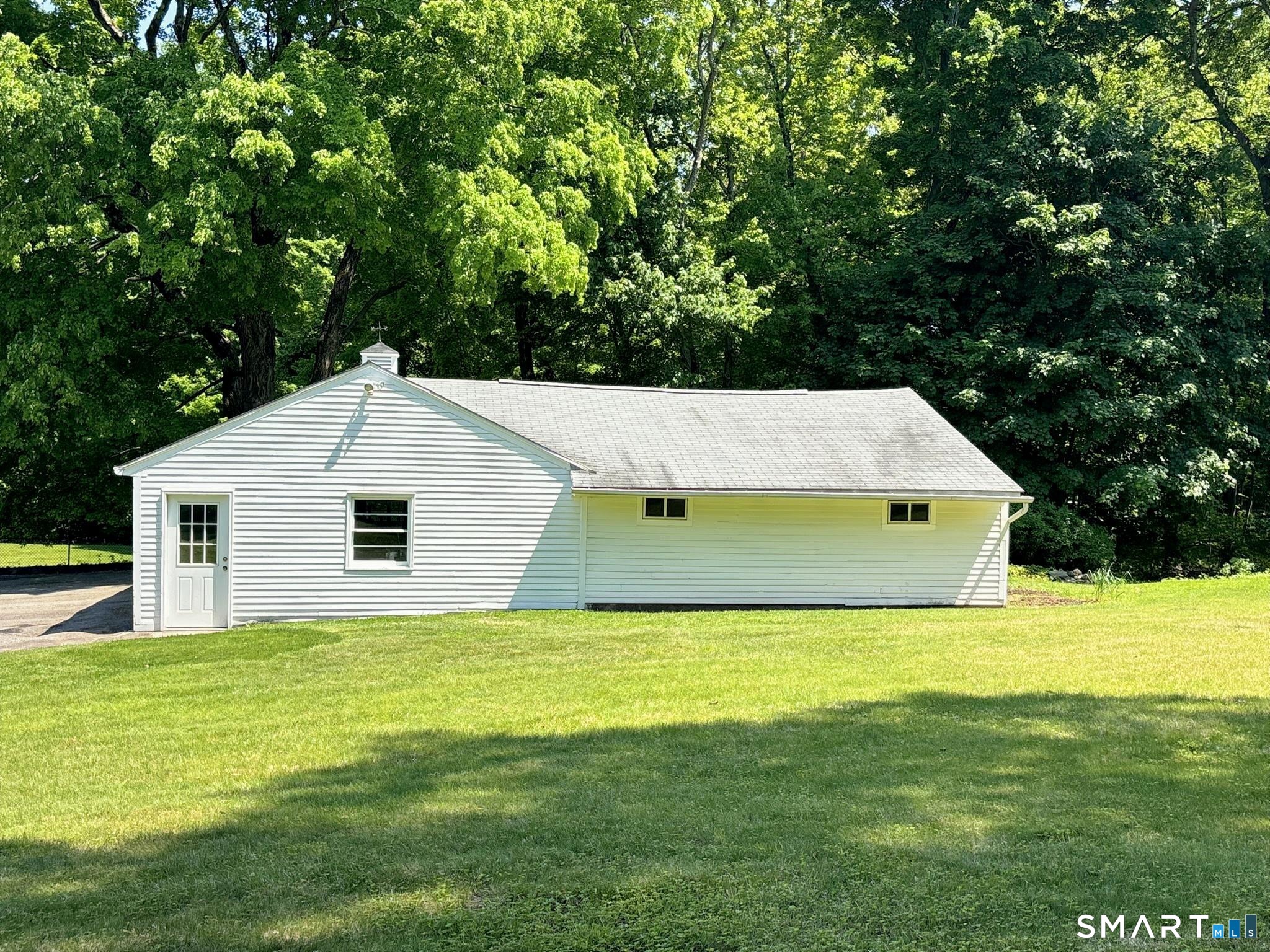 44 Summit Road Prospect, CT 06712 - Photo 5 of 40 a view of a house with a yard