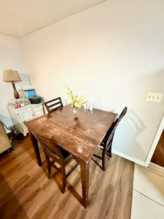 a view of a workspace with furniture