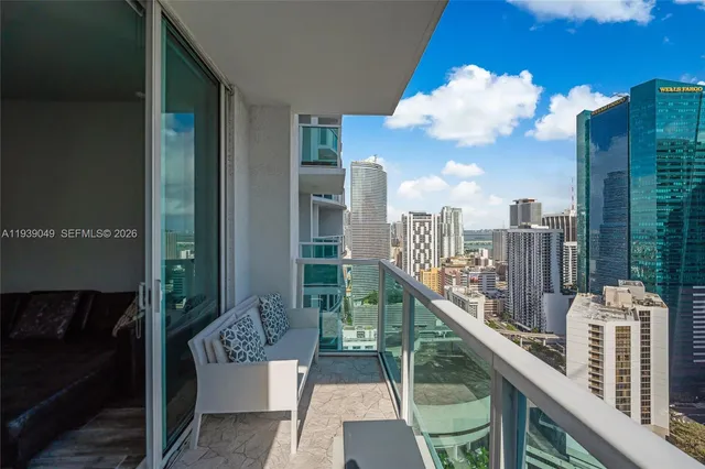 a view of a balcony with city view