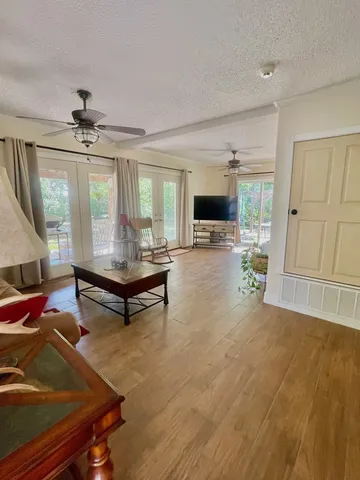 a living room with furniture and a table
