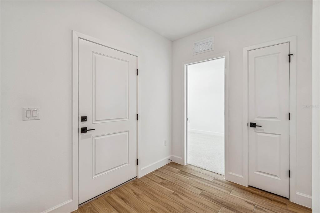 3617 Southwest 153rd Pl Road, Unit 6 Ocala, FL 34473 - Photo 2 of 31 a view of empty room with wooden floor