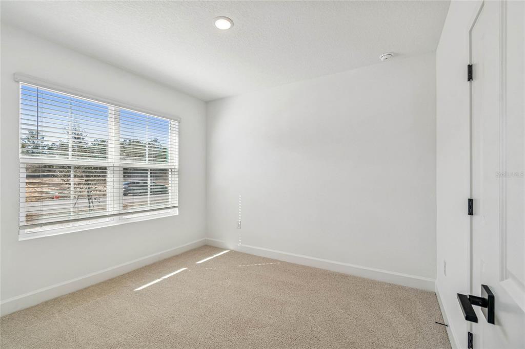 3617 Southwest 153rd Pl Road, Unit 6 Ocala, FL 34473 - Photo 3 of 31 a view of an empty room with a window