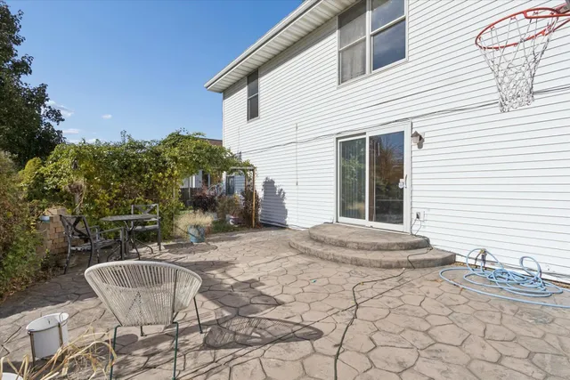 a backyard of a house with seating space