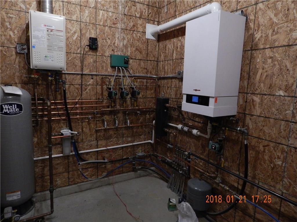 220 Potter Road Hudson, ME 04449 - Photo 27 of 35 Utility room with High-efficiency...