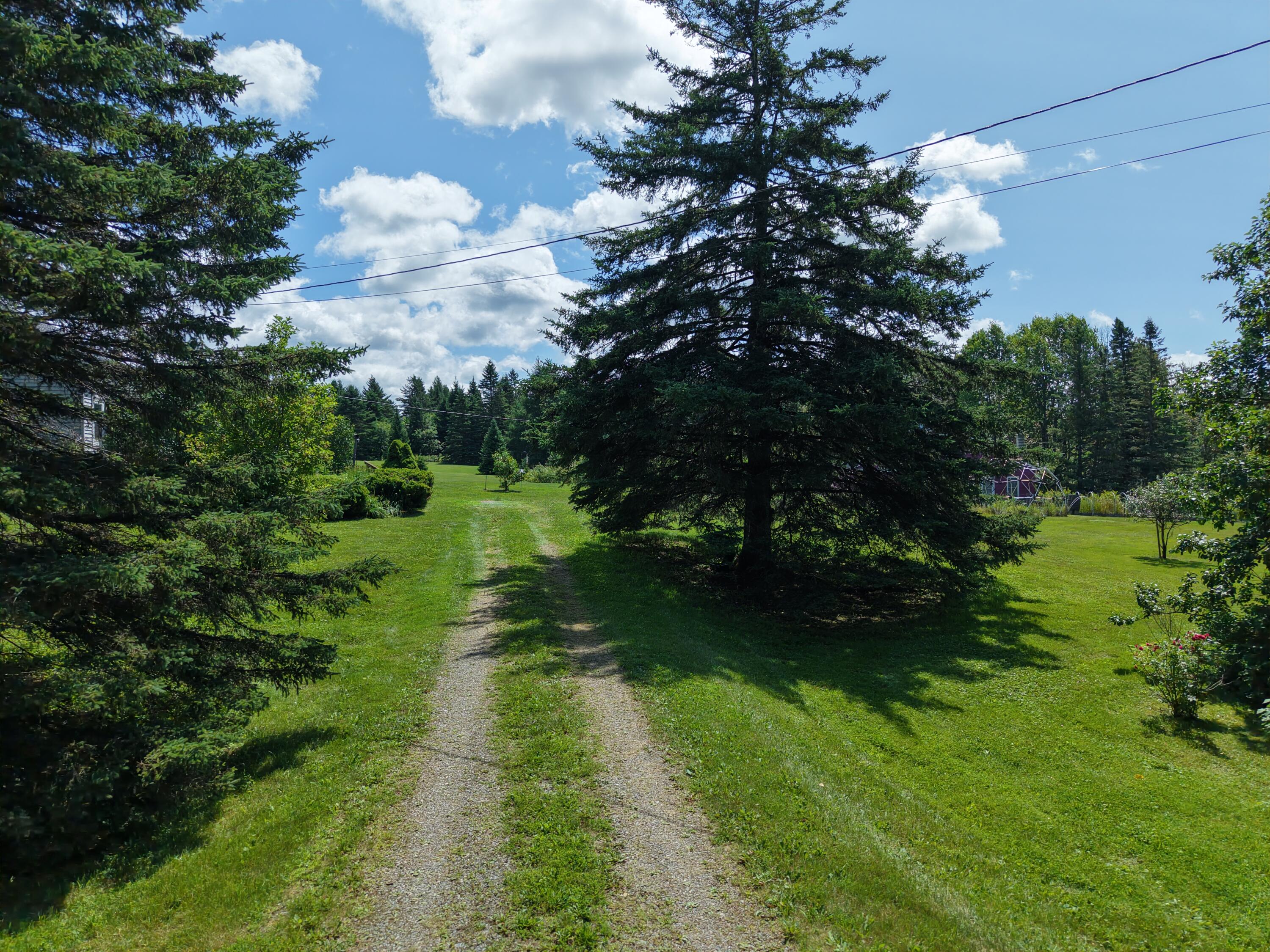 593 Skedgell Road Orient, ME 04471 - Photo 2 of 32 DJI_20260723112431_0105_D