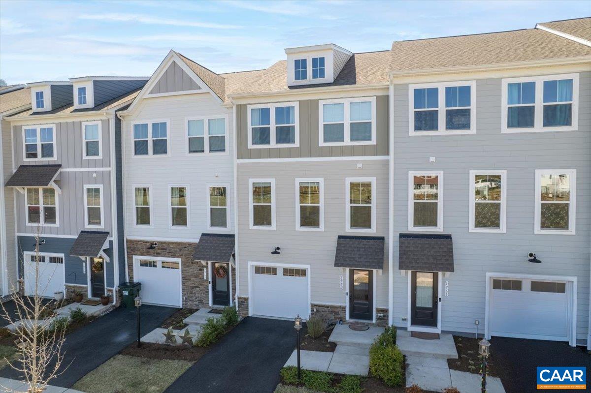 5963 McComb Street Crozet, VA 22932 - Photo 1 of 65 a front view of a building with balcony