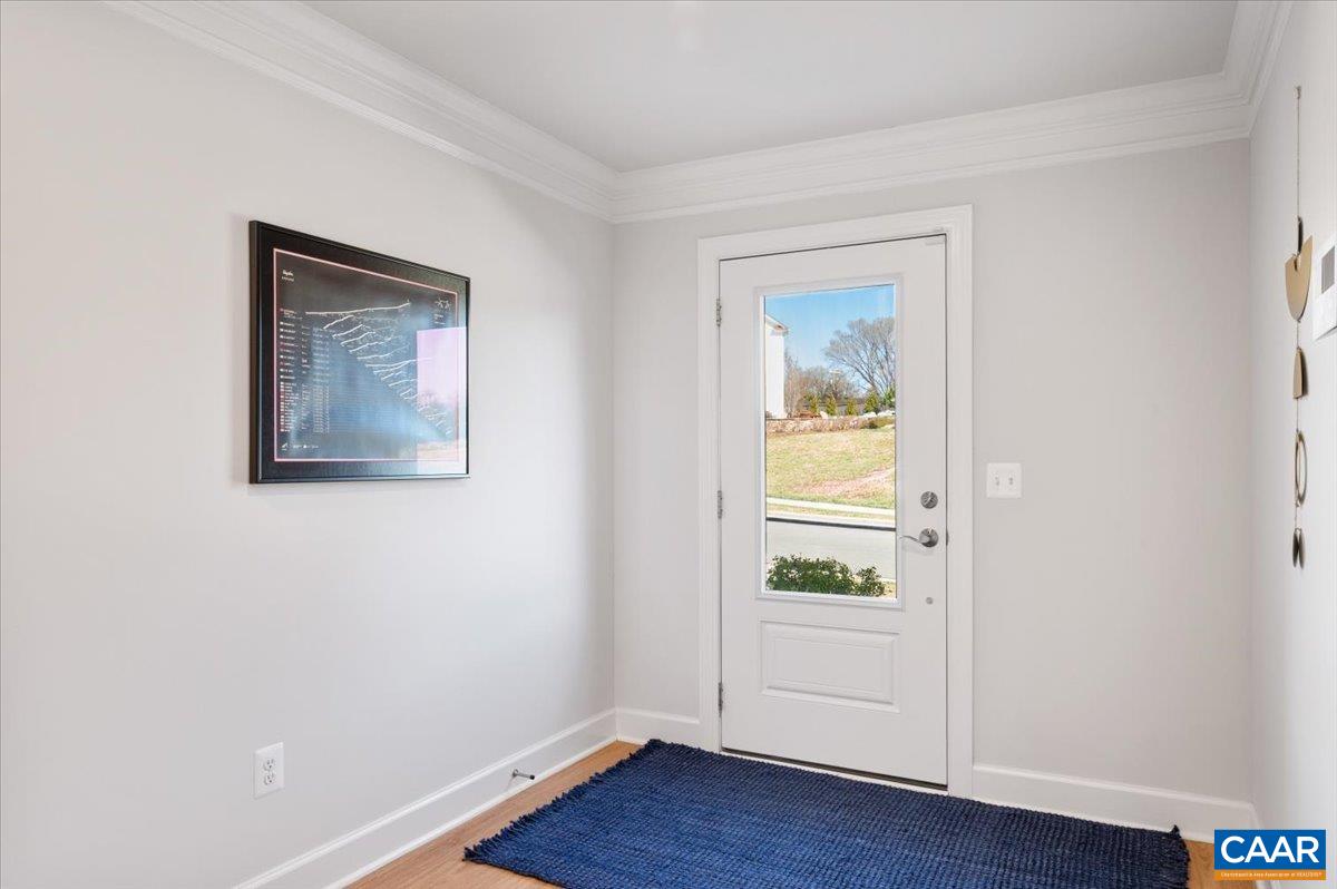 5963 McComb Street Crozet, VA 22932 - Photo 4 of 65 a view of an empty room with wooden floor