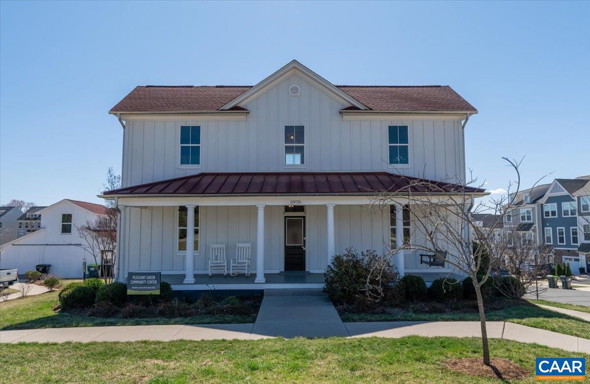 5963 McComb Street Crozet, VA 22932 - Photo 47 of 65 a front view of a house with garden