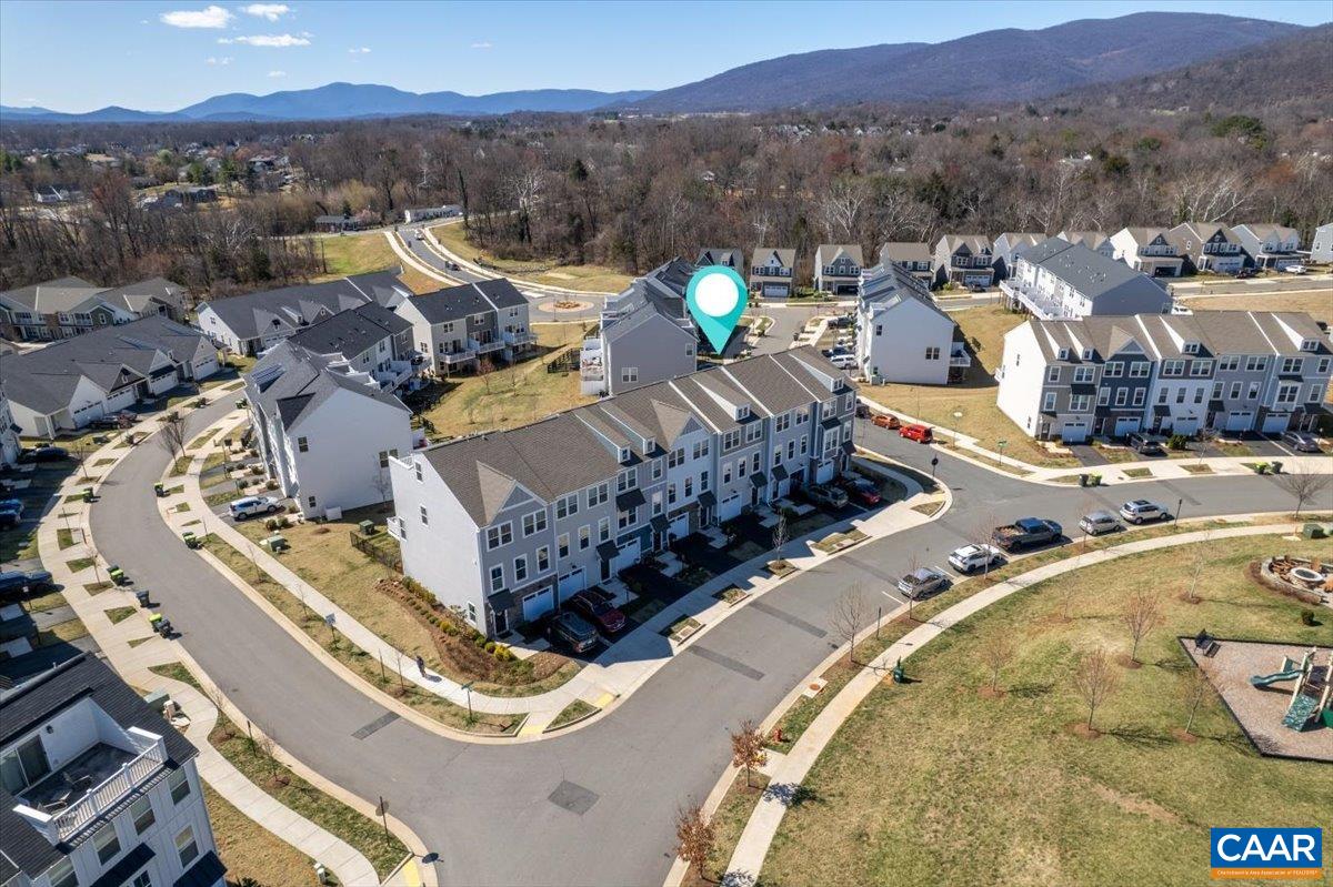 5963 McComb Street Crozet, VA 22932 - Photo 51 of 65 a view of a swimming pool with a lake view
