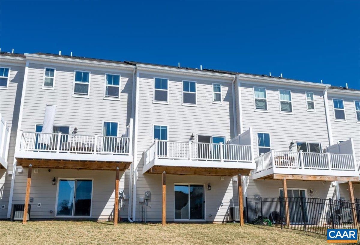 5963 McComb Street Crozet, VA 22932 - Photo 60 of 65 a front view of a house with glass windows