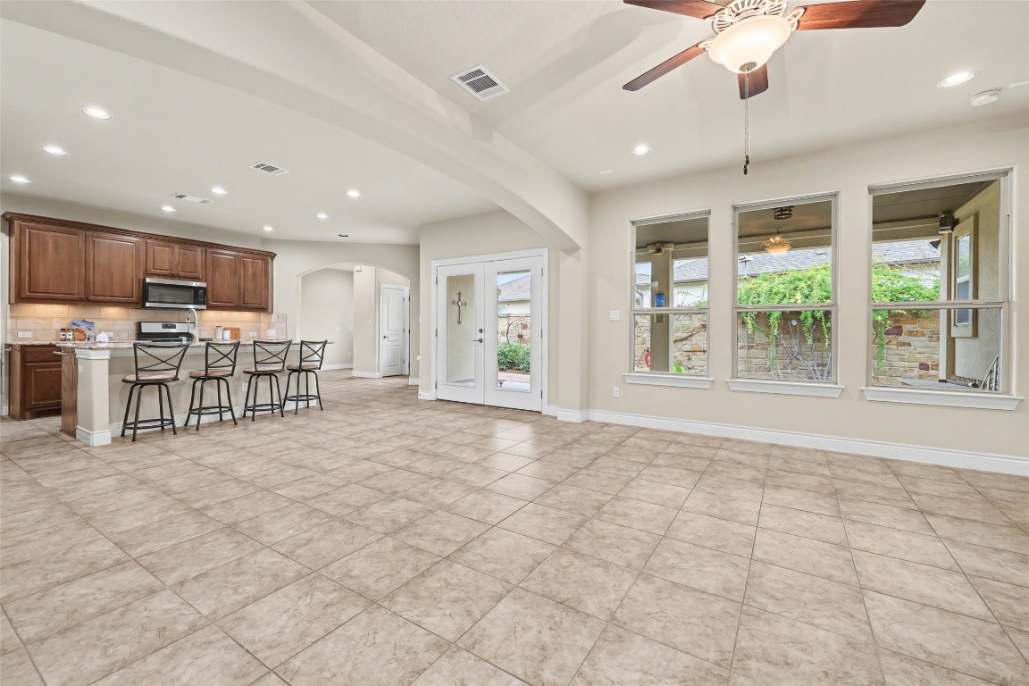 116 Trailing Lantana Drive, Unit G Georgetown, TX 78628 - Photo 20 of 38 a view of a kitchen with furniture and a kitchen