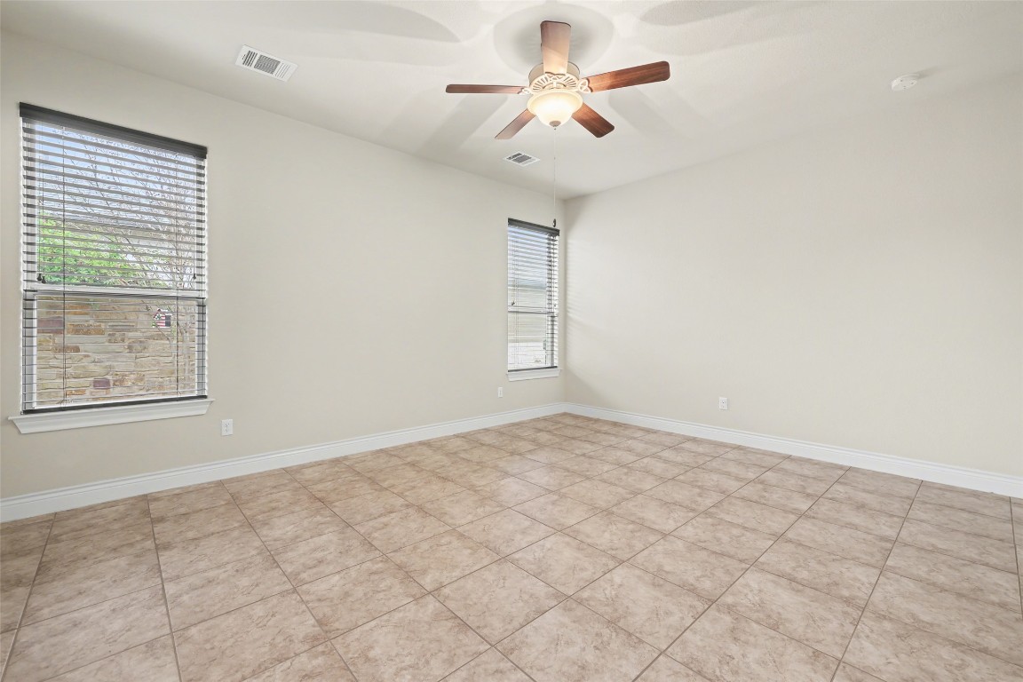 116 Trailing Lantana Drive, Unit G Georgetown, TX 78628 - Photo 21 of 38 a view of an empty room with a window
