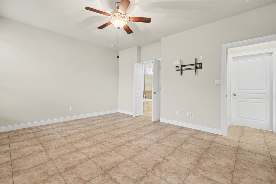 116 Trailing Lantana Drive, Unit G Georgetown, TX 78628 - Photo 23 of 38 wooden floor in an empty room