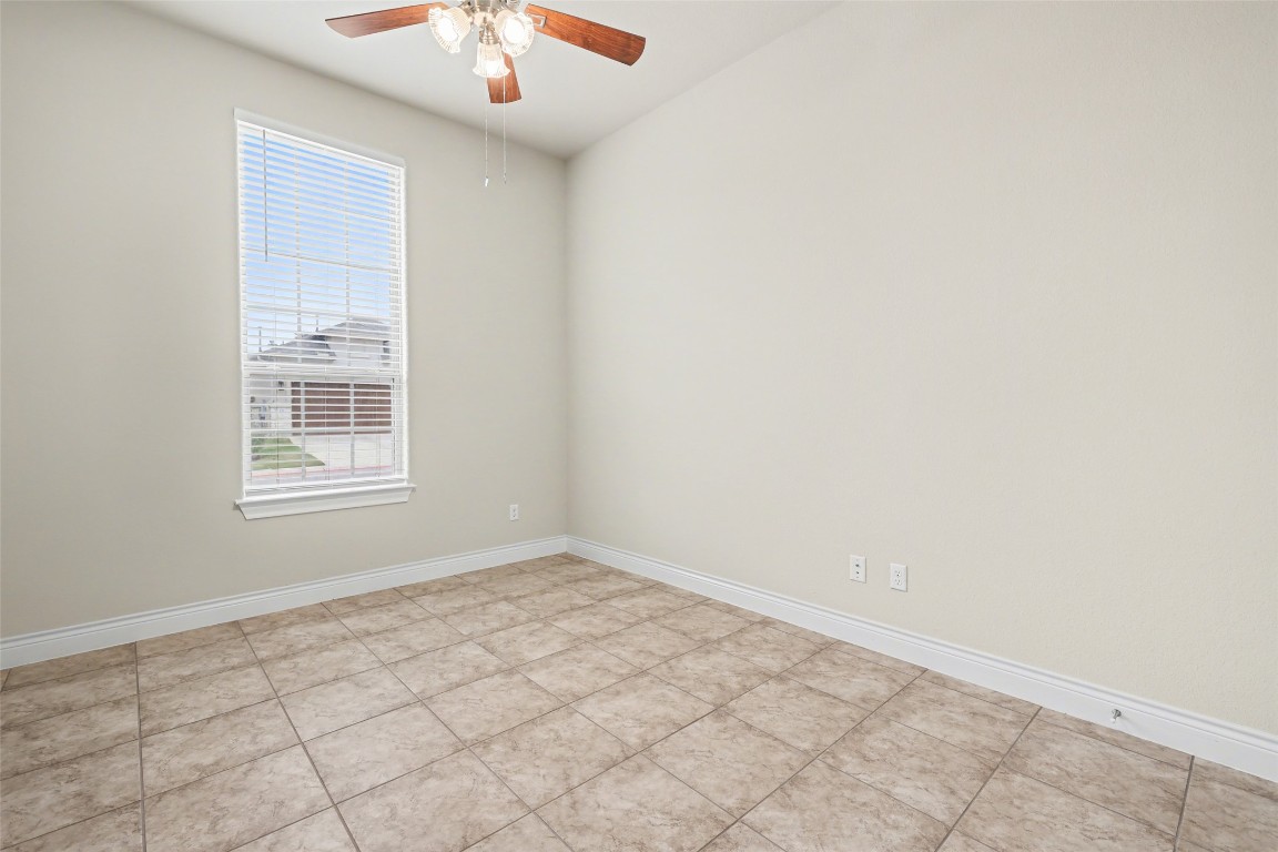 116 Trailing Lantana Drive, Unit G Georgetown, TX 78628 - Photo 34 of 38 a view of an empty room with a window
