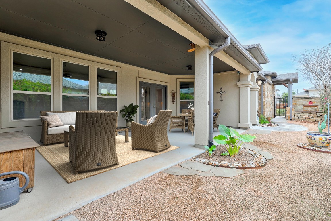 116 Trailing Lantana Drive, Unit G Georgetown, TX 78628 - Photo 38 of 38 a view of an house with backyard and sitting area