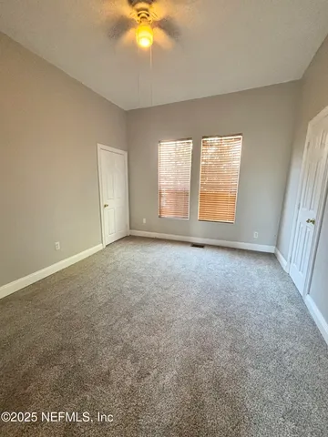 an empty room with window