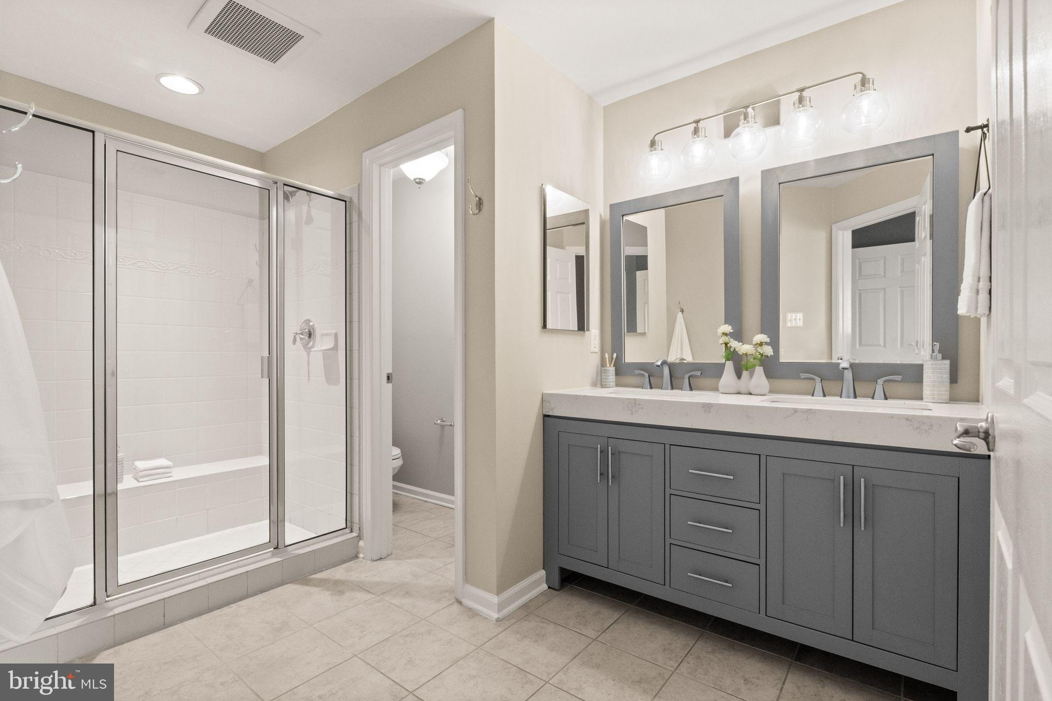 7015 Trek Way Gainesville, VA 20155 - Photo 25 of 56 Large en-suite primary bathroom