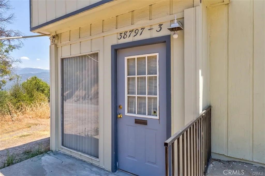 38797 Highway 41 Oakhurst, CA 93644 - Photo 20 of 27 a view of front door of house