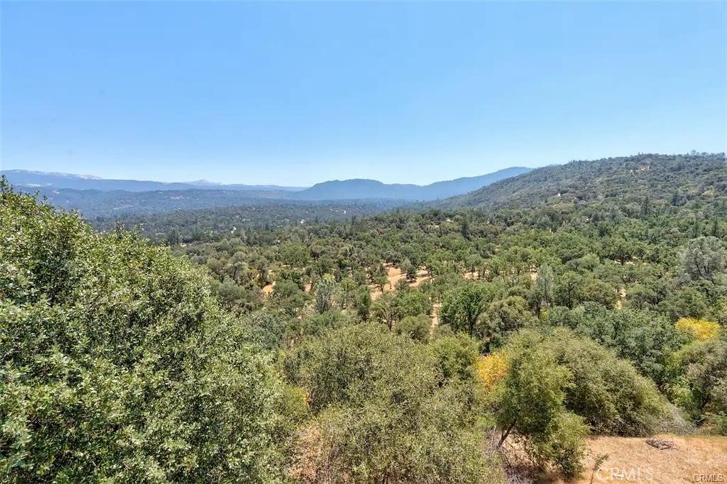 38797 Highway 41 Oakhurst, CA 93644 - Photo 3 of 27 a view of a city with mountain