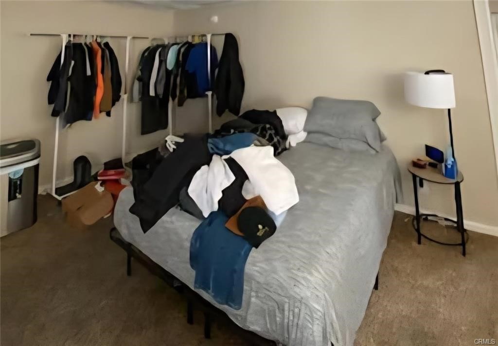 38797 Highway 41 Oakhurst, CA 93644 - Photo 9 of 27 a living room with furniture and a lamp