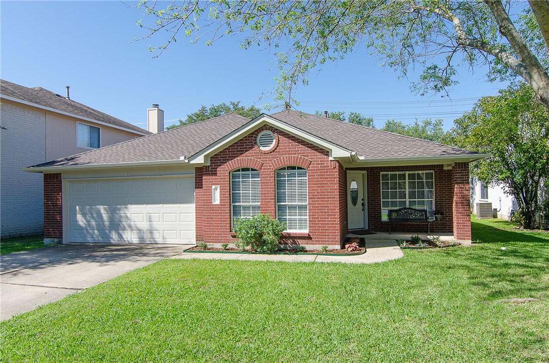 3033 Bent Tree Loop Round Rock, TX 78681 - Photo 1 of 1 a front view of a house with a yard and garage
