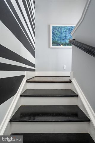 a view of a chairs and table in the patio