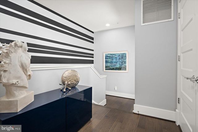 an aerial view of a house with a yard and mountain view