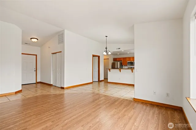 a view of a dining room with furniture window and outside view
