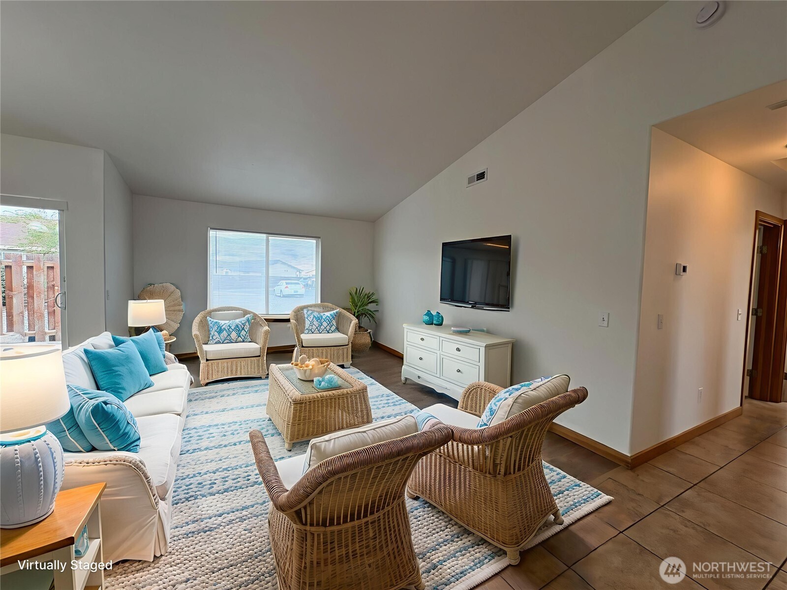 509B Clubhouse Way, Unit A Mattawa, WA 99349 - Photo 14 of 29 a living room with furniture a flat screen tv and a window