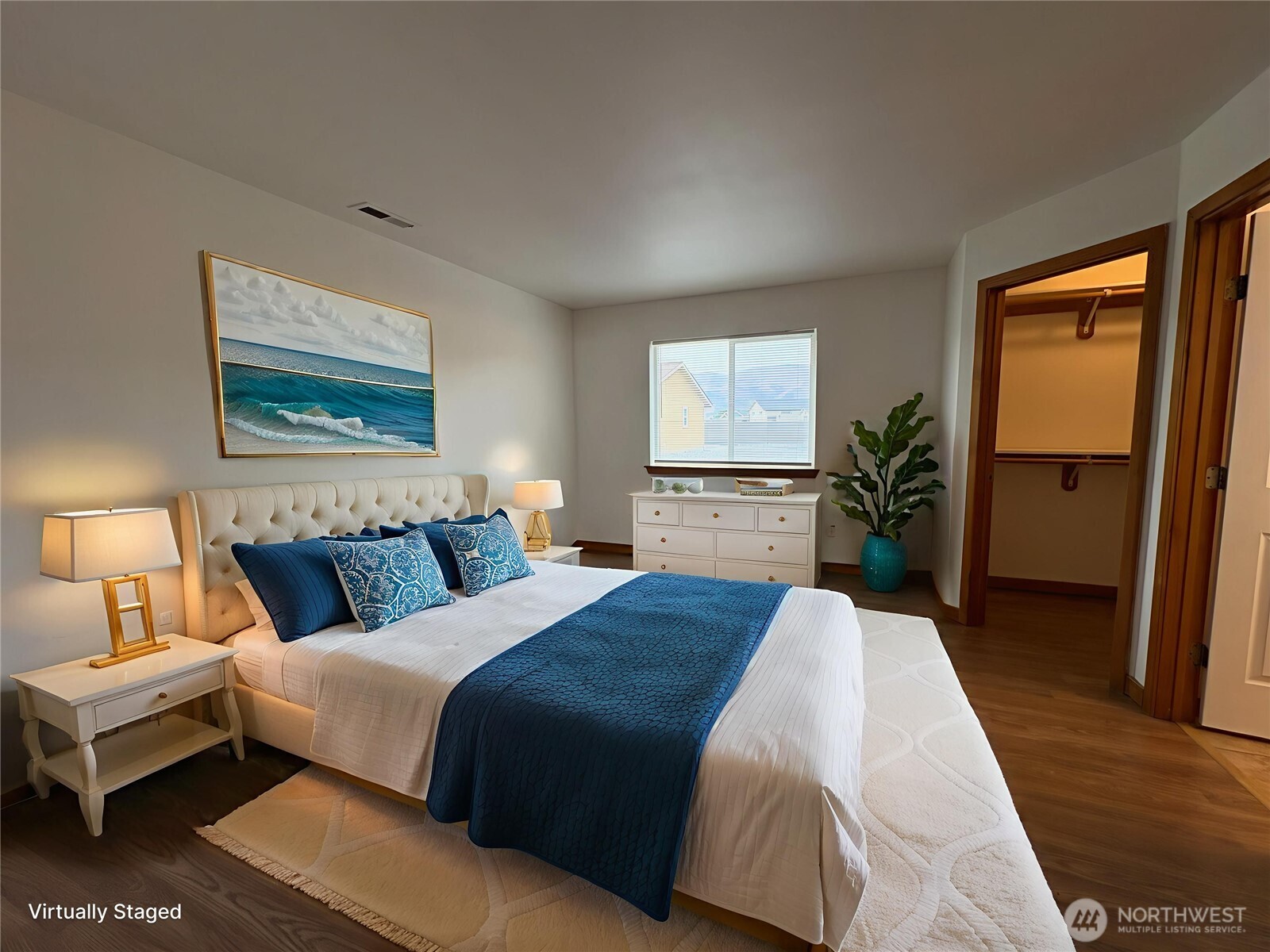 509B Clubhouse Way, Unit A Mattawa, WA 99349 - Photo 19 of 29 a spacious bedroom with a bed and a lamp on dresser