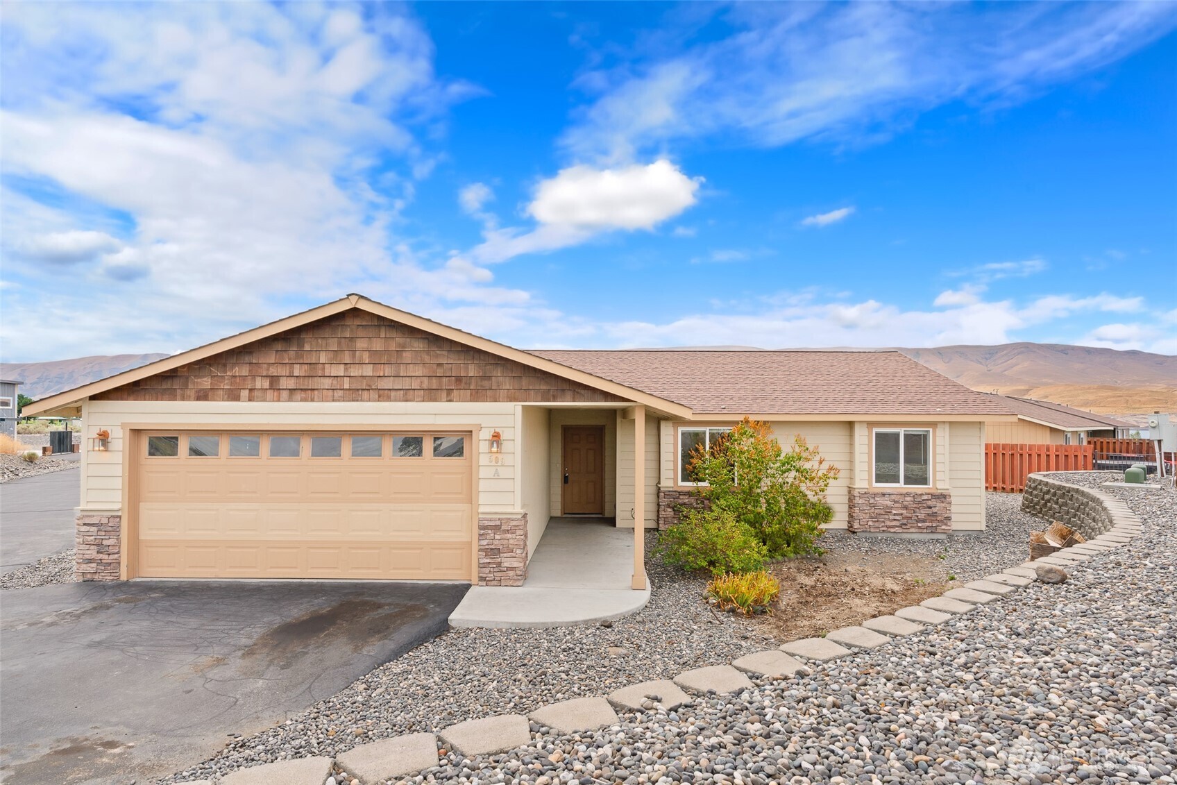 509B Clubhouse Way, Unit A Mattawa, WA 99349 - Photo 3 of 29 a view of a house with a yard