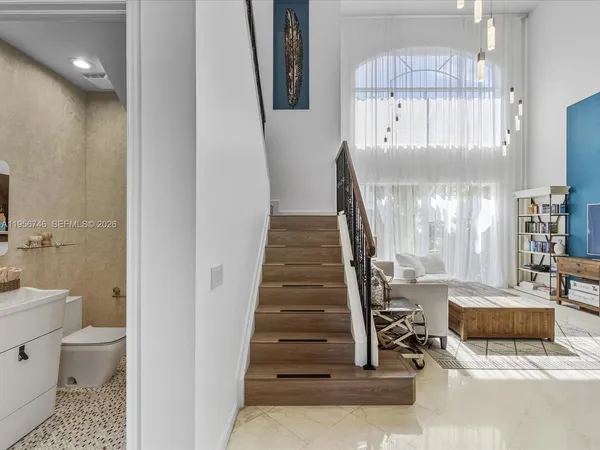 a bedroom with a bed and a cabinets