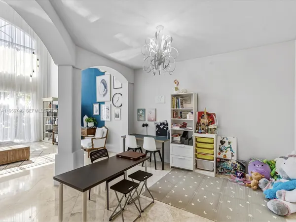a kitchen with a sink appliances and cabinets