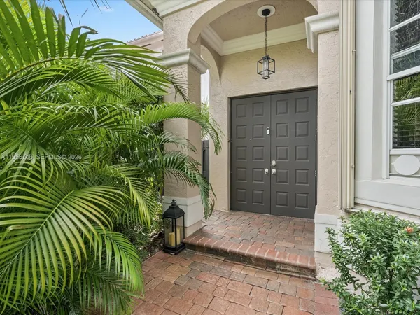 a view of a house with a swimming pool