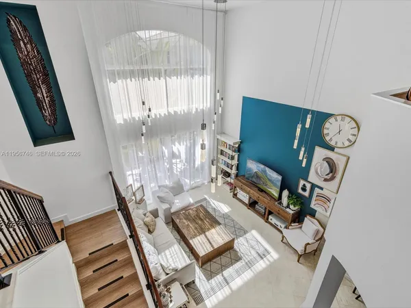 an aerial view of houses with outdoor space