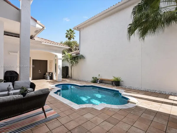 a view of a backyard of a house