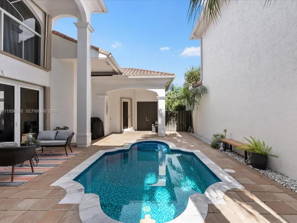 a house with garden in front of it