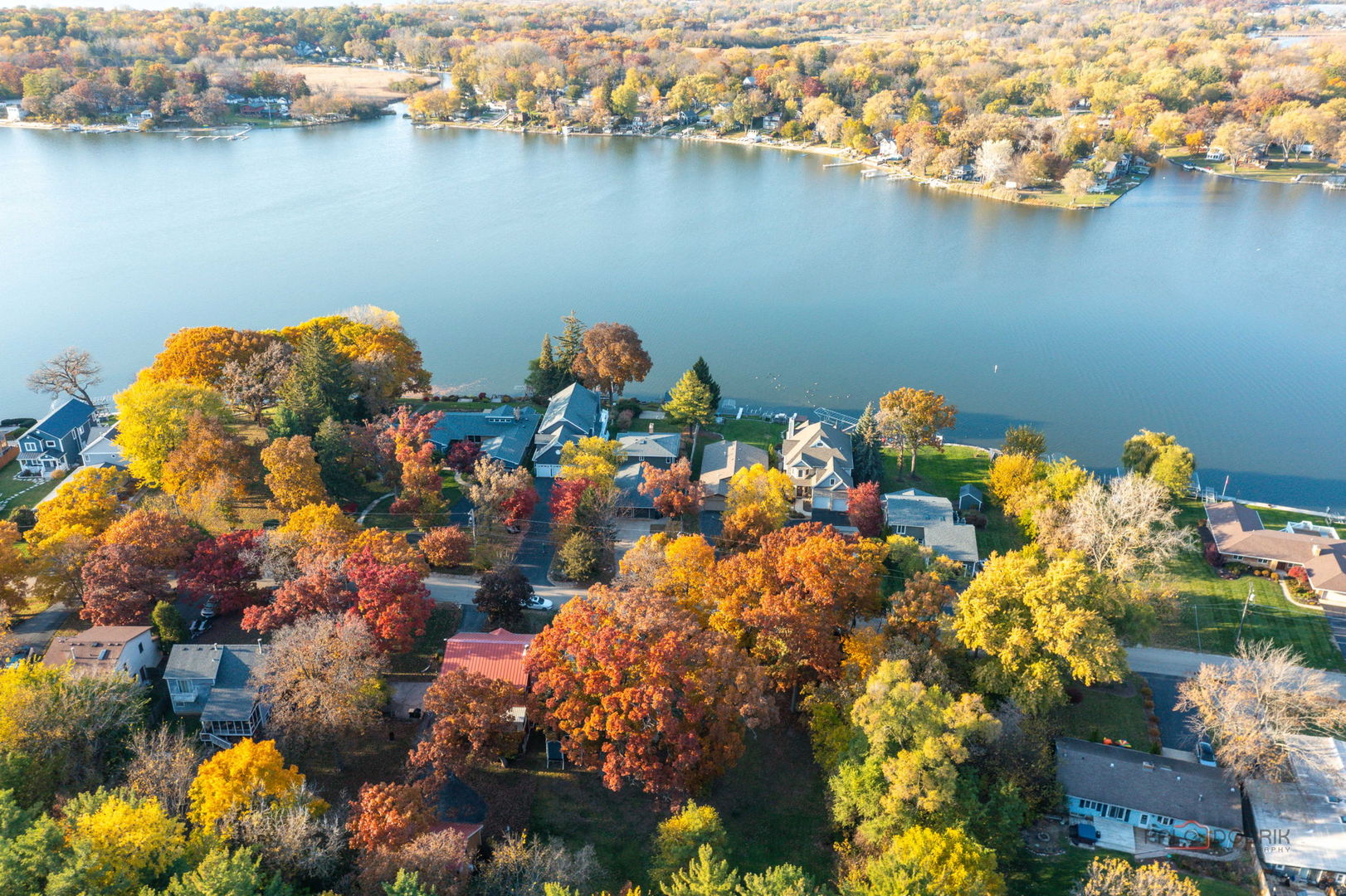 39113 North Cedar Crest Drive Lake Villa, IL 60046 - Photo 22 of 22 a picture of a houses with a lake view