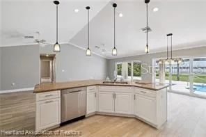 a kitchen with a sink and window