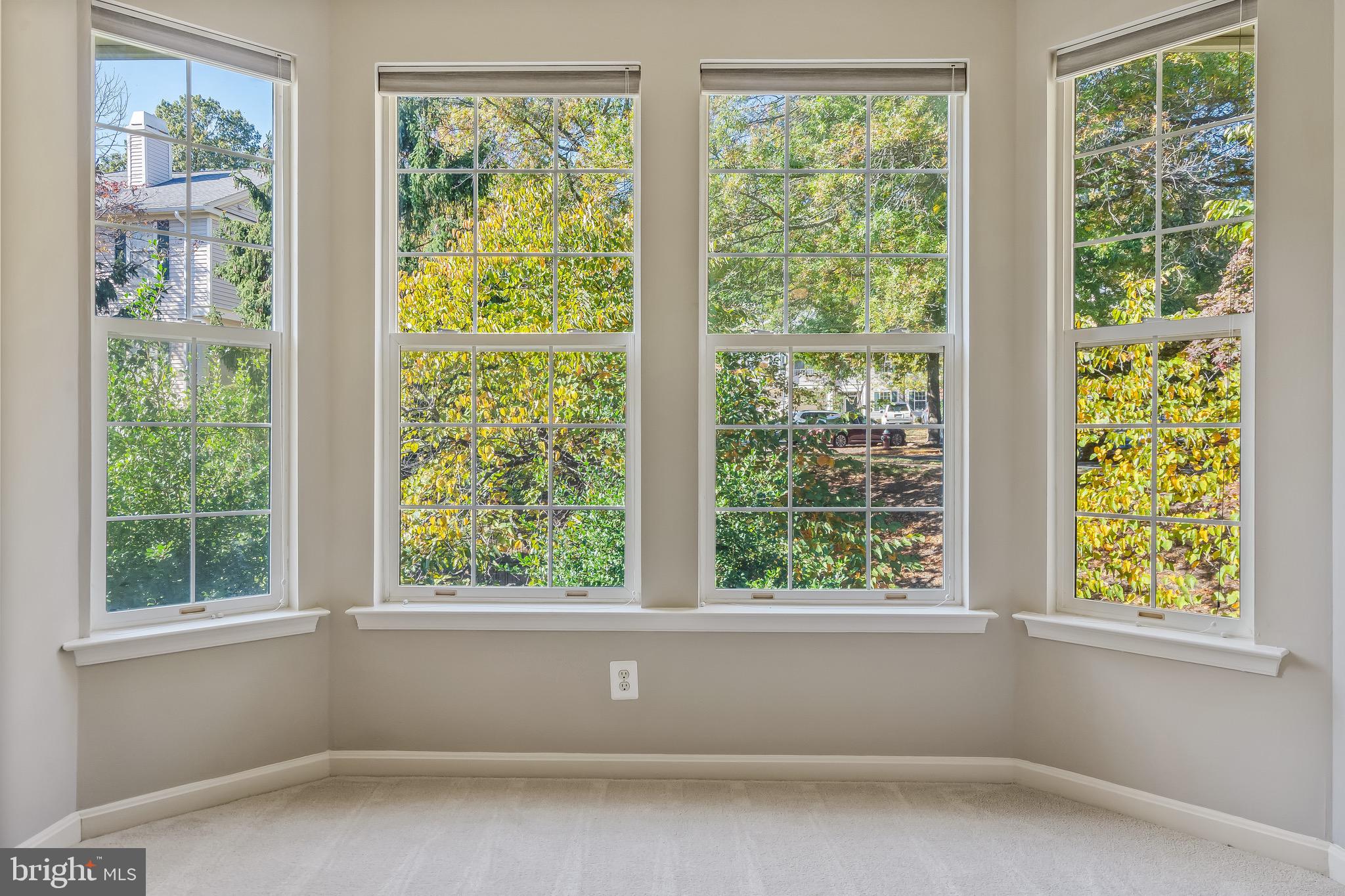 11408 Gate Hill Place, Unit 113 Reston, VA 20194 - Photo 22 of 30 a view of empty room with large windows