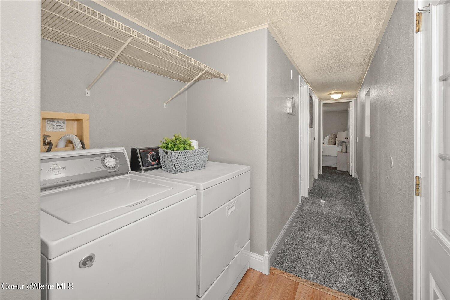 9090 North Runkle Road Hayden, ID 83835 - Photo 18 of 40 Lovely laundry area with shelving!