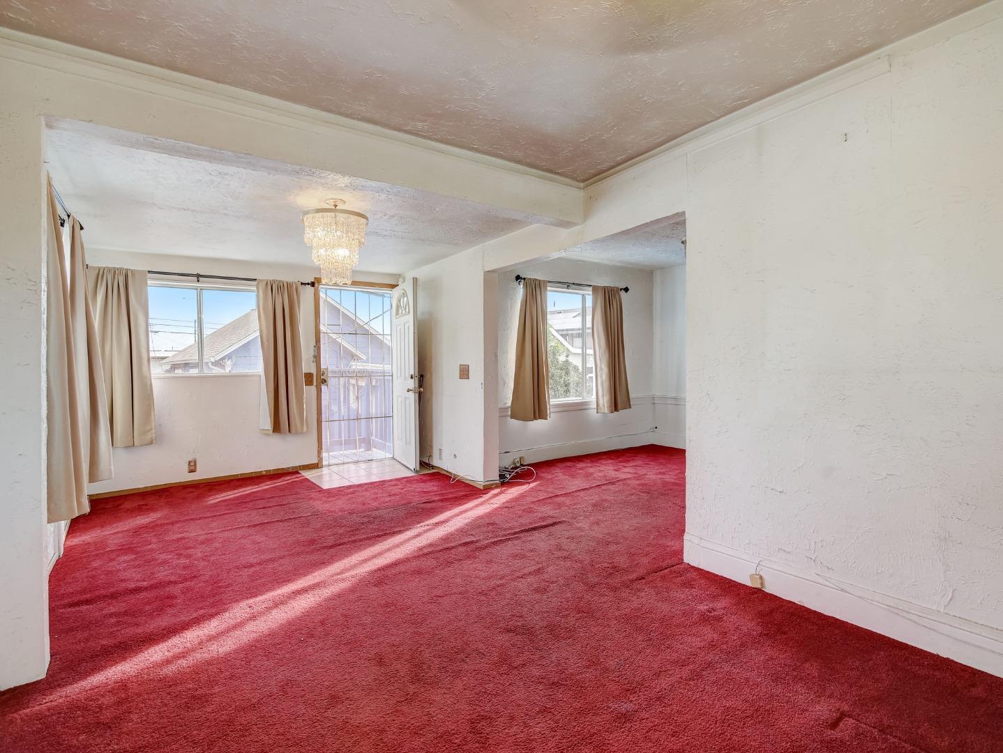 1164 Ocean Avenue Oakland, CA 94608 - Photo 18 of 32 a view of an empty room with window