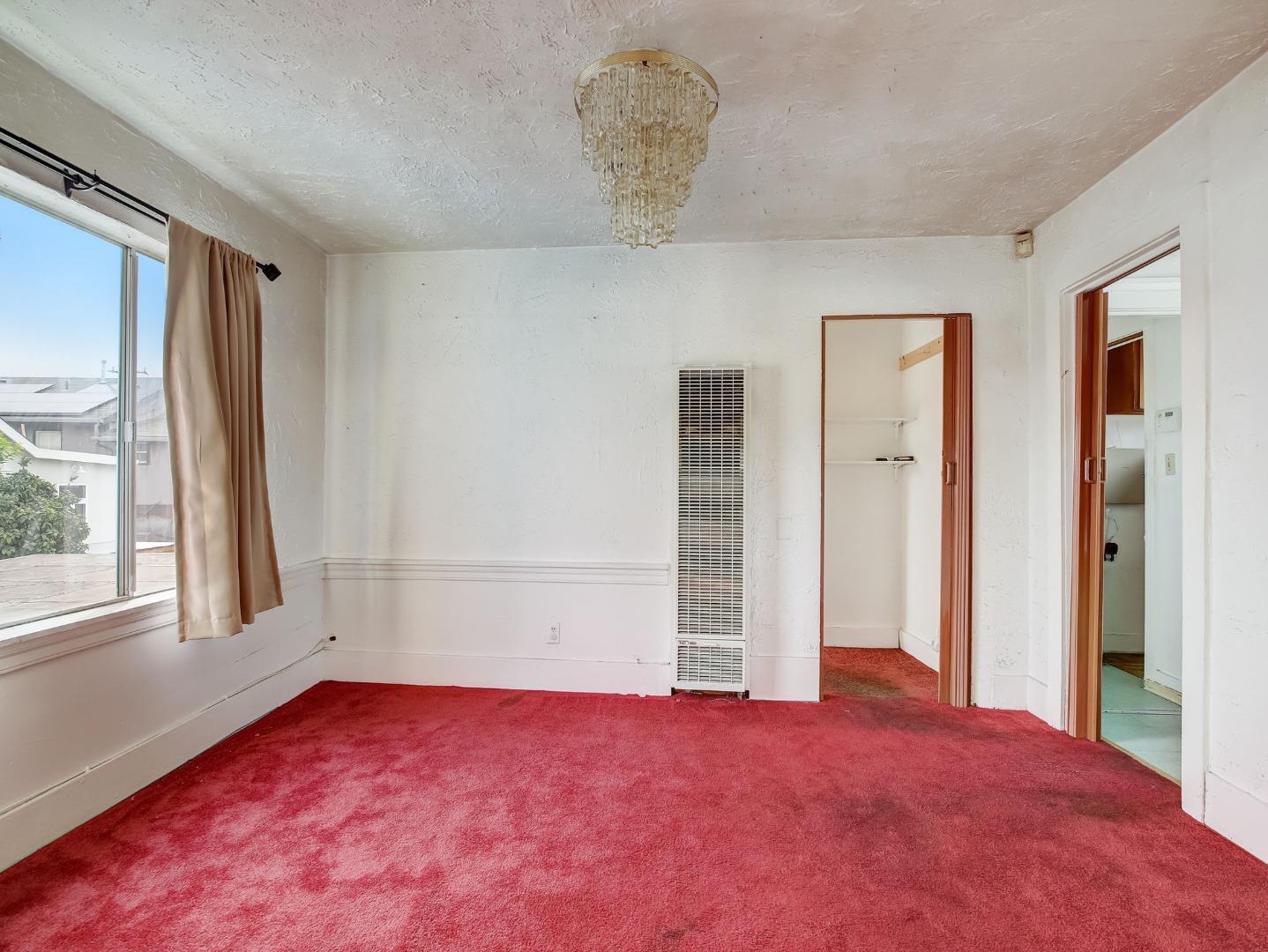 1164 Ocean Avenue Oakland, CA 94608 - Photo 20 of 32 a view of empty room with window