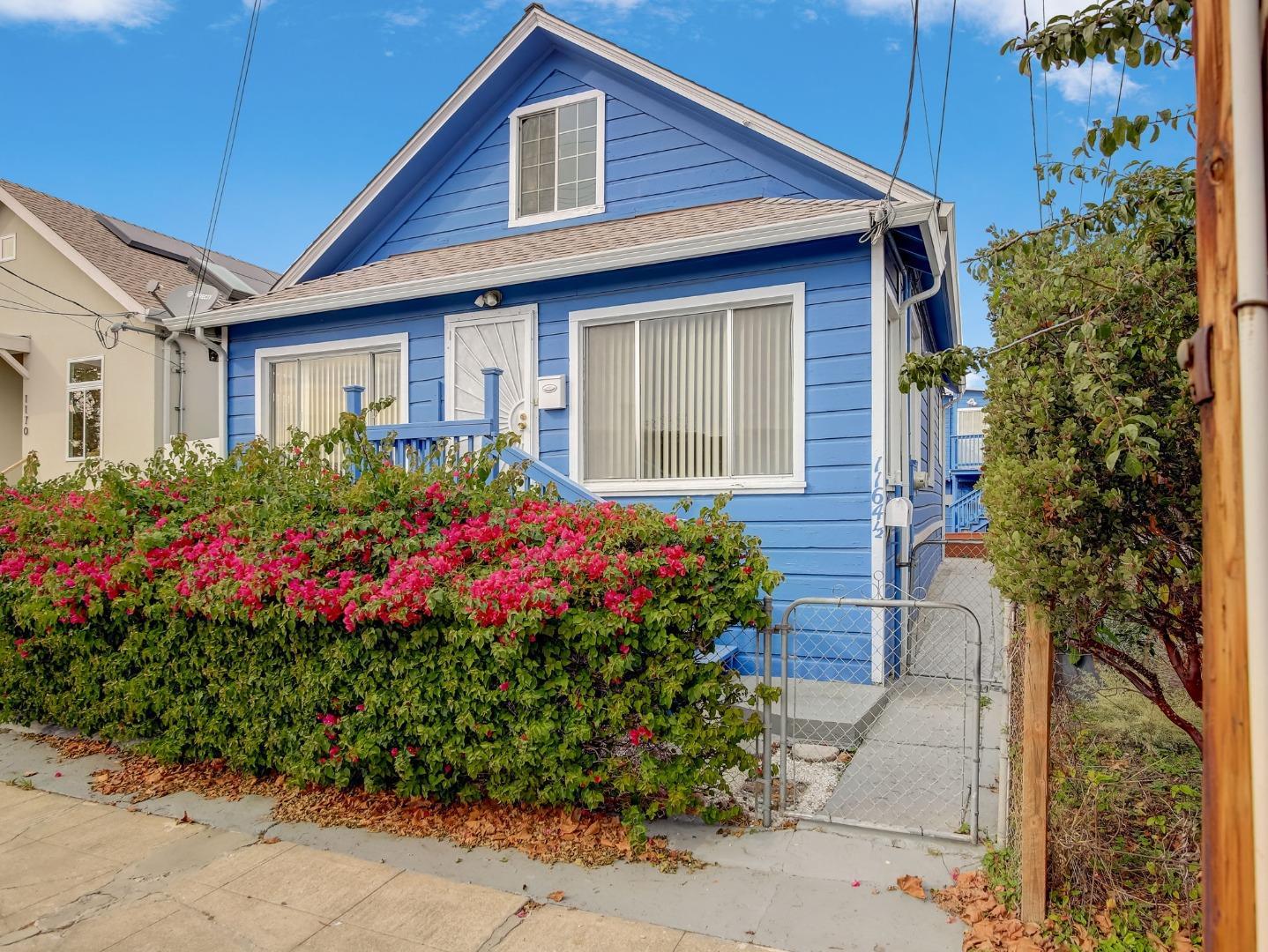 1164 Ocean Avenue Oakland, CA 94608 - Photo 24 of 32 a house with a flower garden