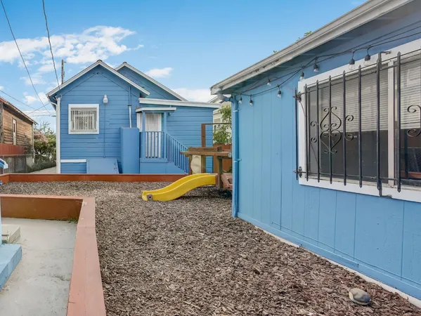 a view of backyard of house