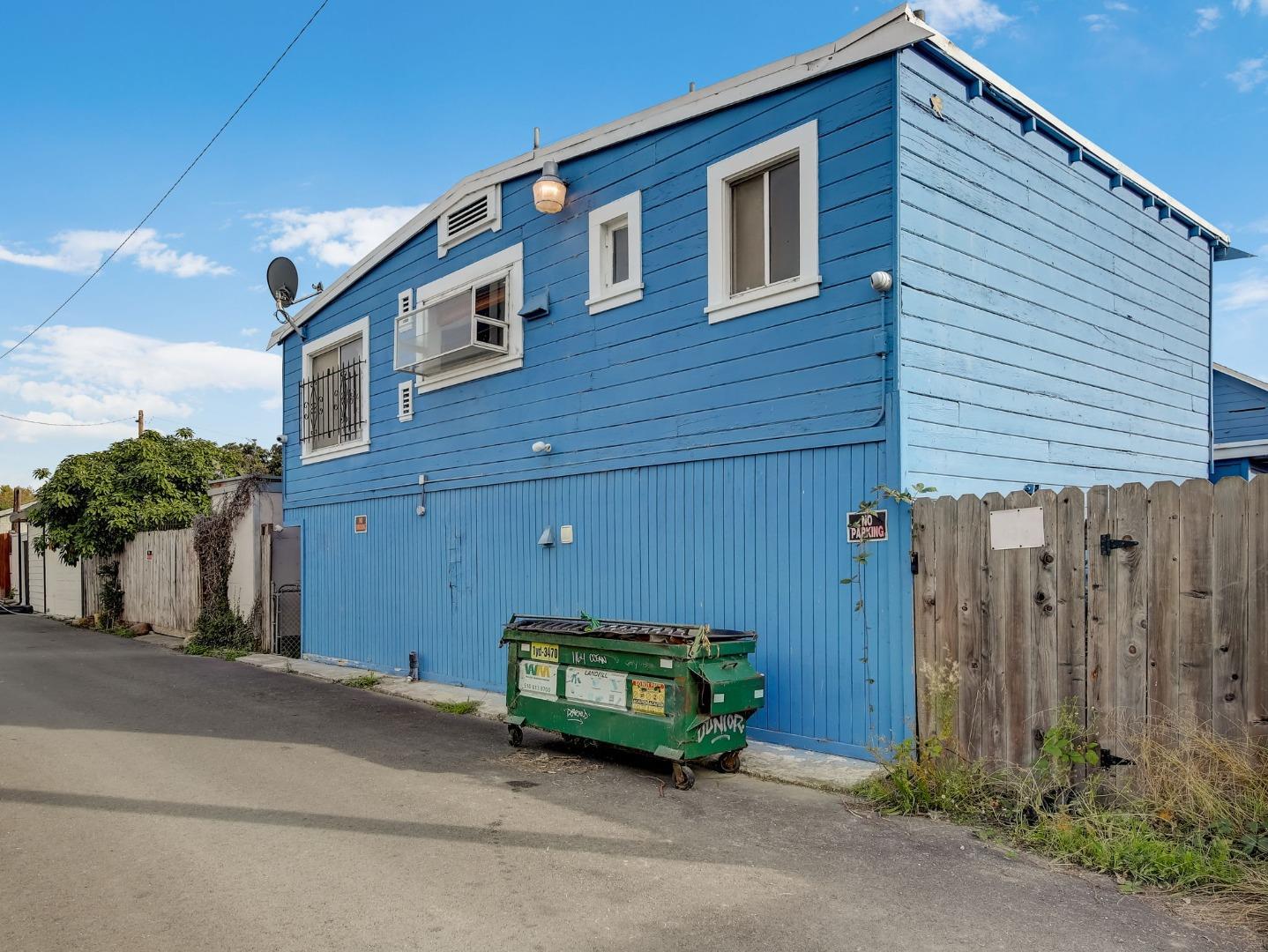 1164 Ocean Avenue Oakland, CA 94608 - Photo 27 of 32 a front view of a house with a garden