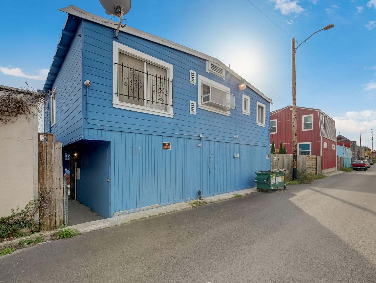 1164 Ocean Avenue Oakland, CA 94608 - Photo 28 of 32 a brick building with a large windows