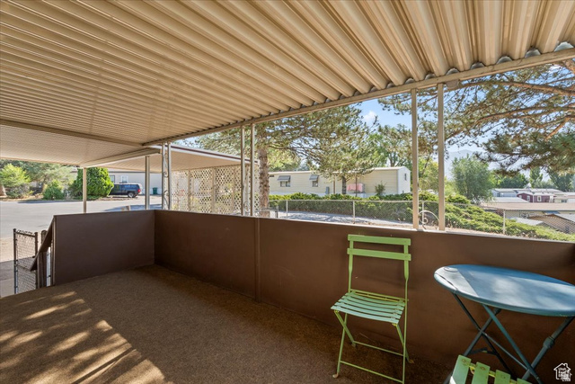 2875 North Hill Field Road, Unit 17 Layton, UT 84041 - Photo 17 of 23 View of unfurnished sunroom
